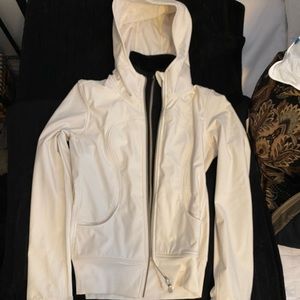 Hooded running jacket with removable fleece